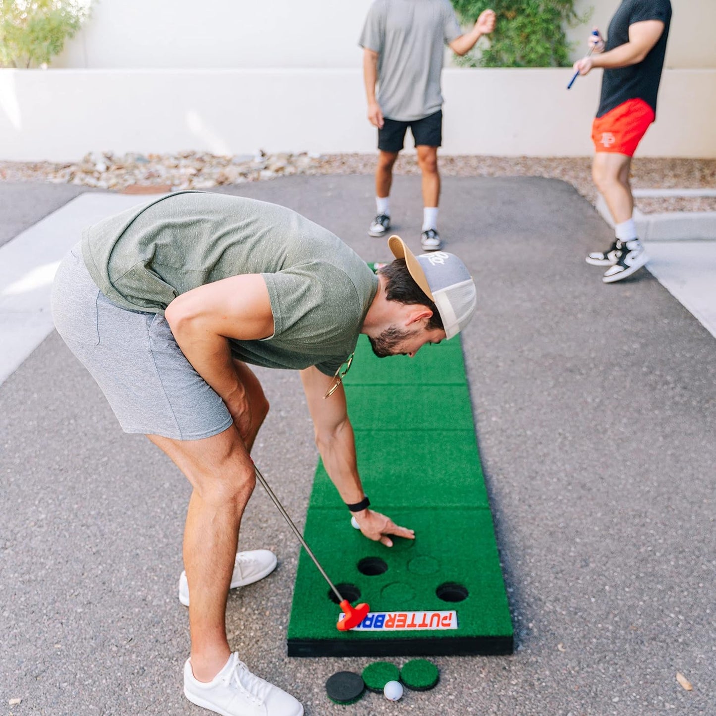 PutterBall Original Golf Putting Game Set – Backyard 12 ft Putting Green Pong Style Golf Mat with 2 Putters, 2 Balls & Hole Covers (PutterBall Original)